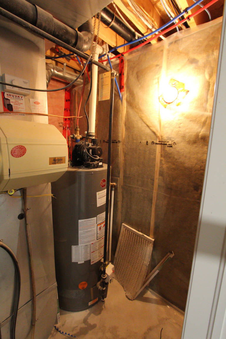furnace room with furnace - basement renovation